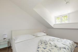 Ένα ή περισσότερα κρεβάτια σε δωμάτιο στο Apartmant Centar Split