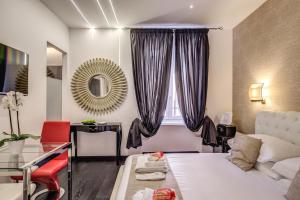 A television and/or entertainment centre at Navona Living Rome