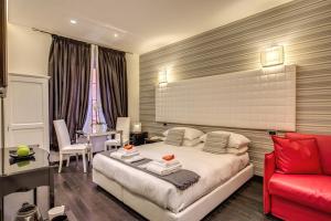 A bed or beds in a room at Navona Living Rome