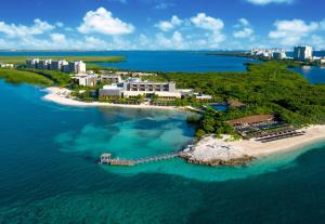 an aerial view of a resort on an island in the water at Nizuc Resort & Spa in Cancún