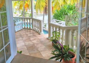 Balkón nebo terasa v ubytování Marigot Beach Club & Dive Resort