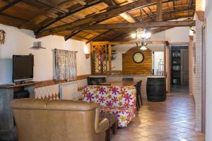 a living room with a couch and a table at Country Apartments in Castel di Decima