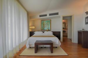 Posteľ alebo postele v izbe v ubytovaní Eden Rock Resort