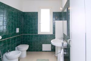 Ванная комната в Aria di Mare