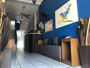TV a/nebo společenská místnost v ubytování Hotel San Juan