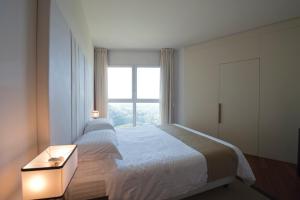 Posteľ alebo postele v izbe v ubytovaní Eden Rock Resort