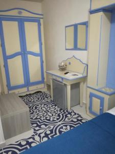 Llit o llits en una habitació de Benvenuti al Sud B&B