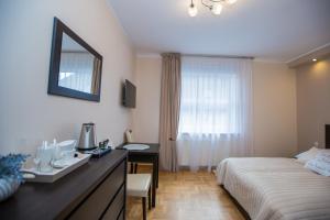 Posteľ alebo postele v izbe v ubytovaní Savona Świnoujście