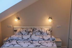 Posteľ alebo postele v izbe v ubytovaní Apartament "Zacisze" + 28 fotografií