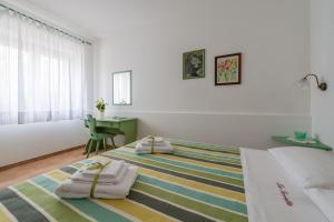 Ένα ή περισσότερα κρεβάτια σε δωμάτιο στο La Torretta di Casa Lippi