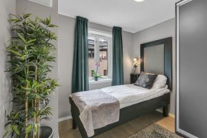 Postel nebo postele na pokoji v ubytování Forenom Serviced Apartments Oslo Opera
