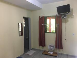 Televisyen dan/atau pusat hiburan di Pousada Alto do Morro