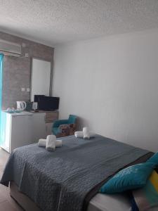 Voodi või voodid majutusasutuse Apartments Zec toas