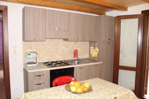 A kitchen or kitchenette at Villa Orizzonte