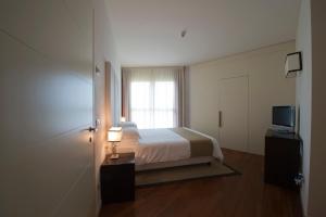 Posteľ alebo postele v izbe v ubytovaní Eden Rock Resort