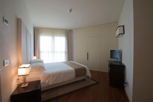 Posteľ alebo postele v izbe v ubytovaní Eden Rock Resort