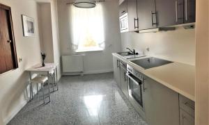 Kuchyň nebo kuchyňský kout v ubytování Haus Sonnenschein