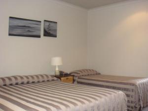 Ένα ή περισσότερα κρεβάτια σε δωμάτιο στο Bristol Motel