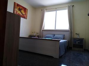 Posteľ alebo postele v izbe v ubytovaní Seaview Mansion Dalaguete Apartment 3