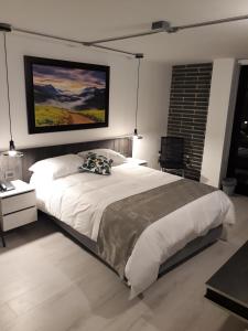Ένα ή περισσότερα κρεβάτια σε δωμάτιο στο Hotel RDOS