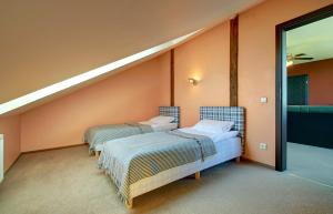 Postel nebo postele na pokoji v ubytování Aerohotel