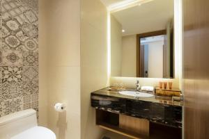 Koupelna v ubytování Comodo Nha Trang Hotel