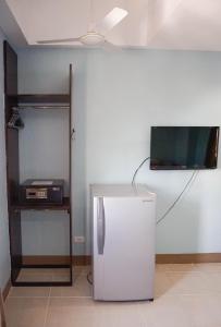 TV a/nebo společenská místnost v ubytování Crowne Garden Hotel