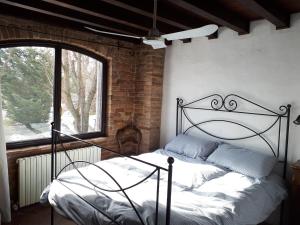 Postelja oz. postelje v sobi nastanitve La Casa Sopra Le Nuvole