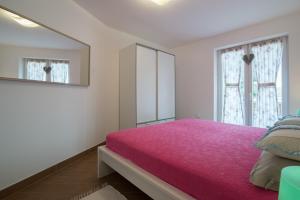 Postel nebo postele na pokoji v ubytování Villa Alice App2