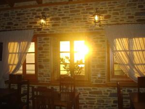 Fotografie z fotogalerie ubytování Archontiko Koti v destinaci Agios Lavredios