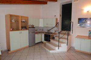 Kuchyň nebo kuchyňský kout v ubytování ApartHotel Gasba