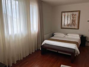 Posteľ alebo postele v izbe v ubytovaní Eden Rock Resort