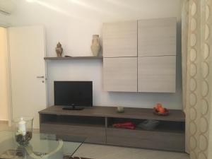 TV a/nebo společenská místnost v ubytování Venere Apartament