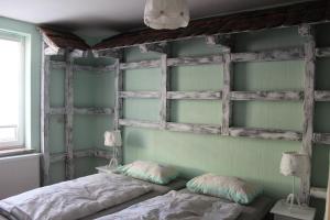 Postel nebo postele na pokoji v ubytování Spreewald Ferienwohnung Lübben