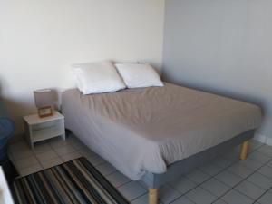 Cama o camas de una habitación en Les Haubans