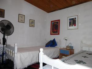 Postel nebo postele na pokoji v ubytování Cottage Stella-eco living-Evia island