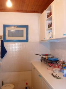 Kuchyň nebo kuchyňský kout v ubytování Cottage Stella-eco living-Evia island