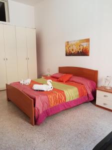 Postel nebo postele na pokoji v ubytování Casa Francy a 5min da Marzamemi