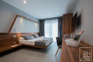 A bed or beds in a room at B&B Rakel Home