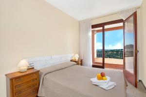 Posteľ alebo postele v izbe v ubytovaní 2Maer - Blanes