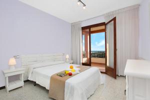 Posteľ alebo postele v izbe v ubytovaní 2Maer - Blanes