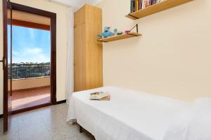 Posteľ alebo postele v izbe v ubytovaní 2Maer - Blanes