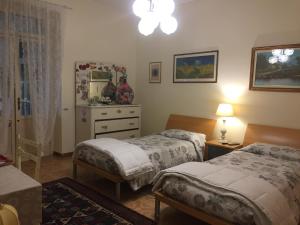 Ліжко або ліжка в номері B & B Da Giusy