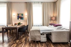 Posteľ alebo postele v izbe v ubytovaní Hotel Sandwirth