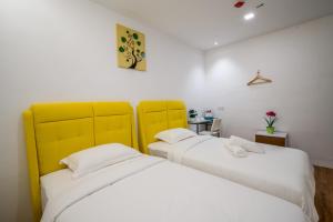 Postel nebo postele na pokoji v ubytování My Sj Hotel