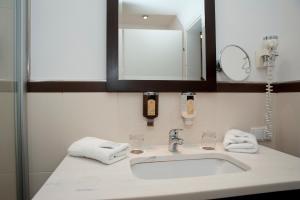 Kúpeľňa v ubytovaní Hotel Sandwirth
