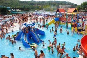 a large crowd of people at a water park at Holiday Wing Apartment 2 in Jagodina