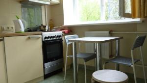 Majoituspaikan Quiet Center Apartment Arena Riga FREE PARKING keittiö tai keittotila