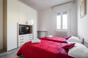 Кровать или кровати в номере Bologna Accommodation - Fiera - Self checkin - 24h