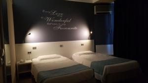 Postel nebo postele na pokoji v ubytování Park Hotel